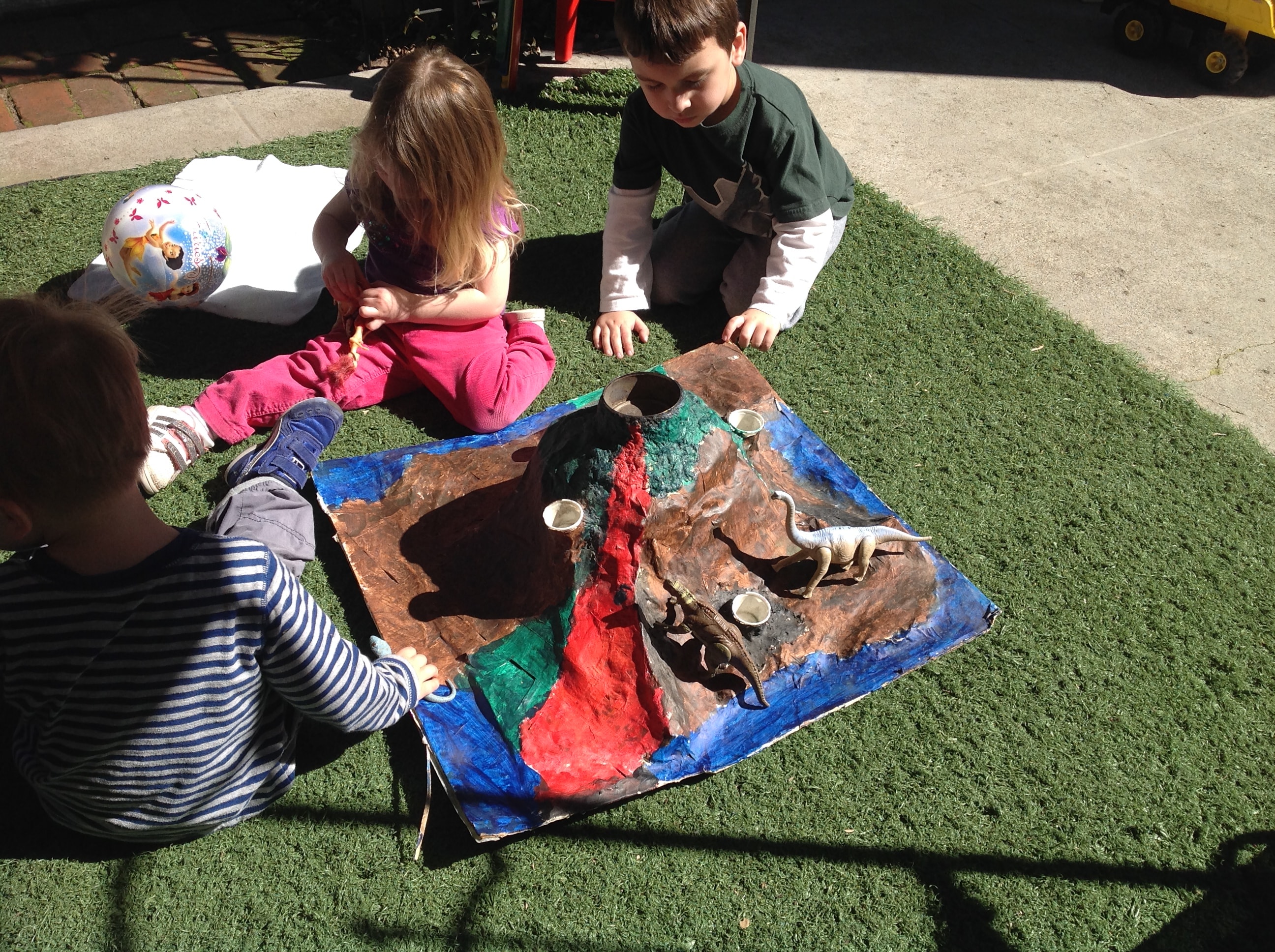 Children playing outdoors in an organic garden setting