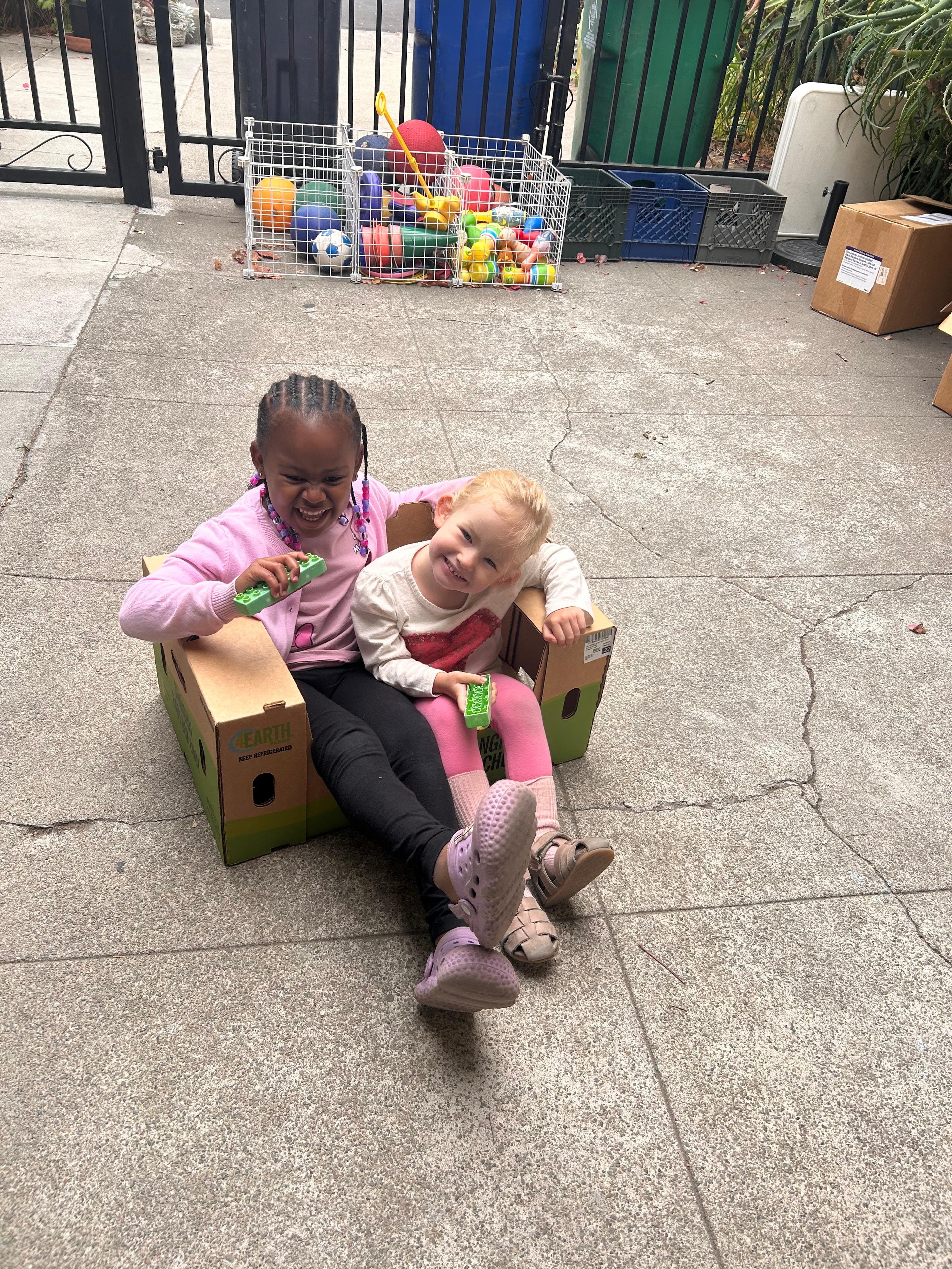 Children sharing a snack together at Little Crumbles